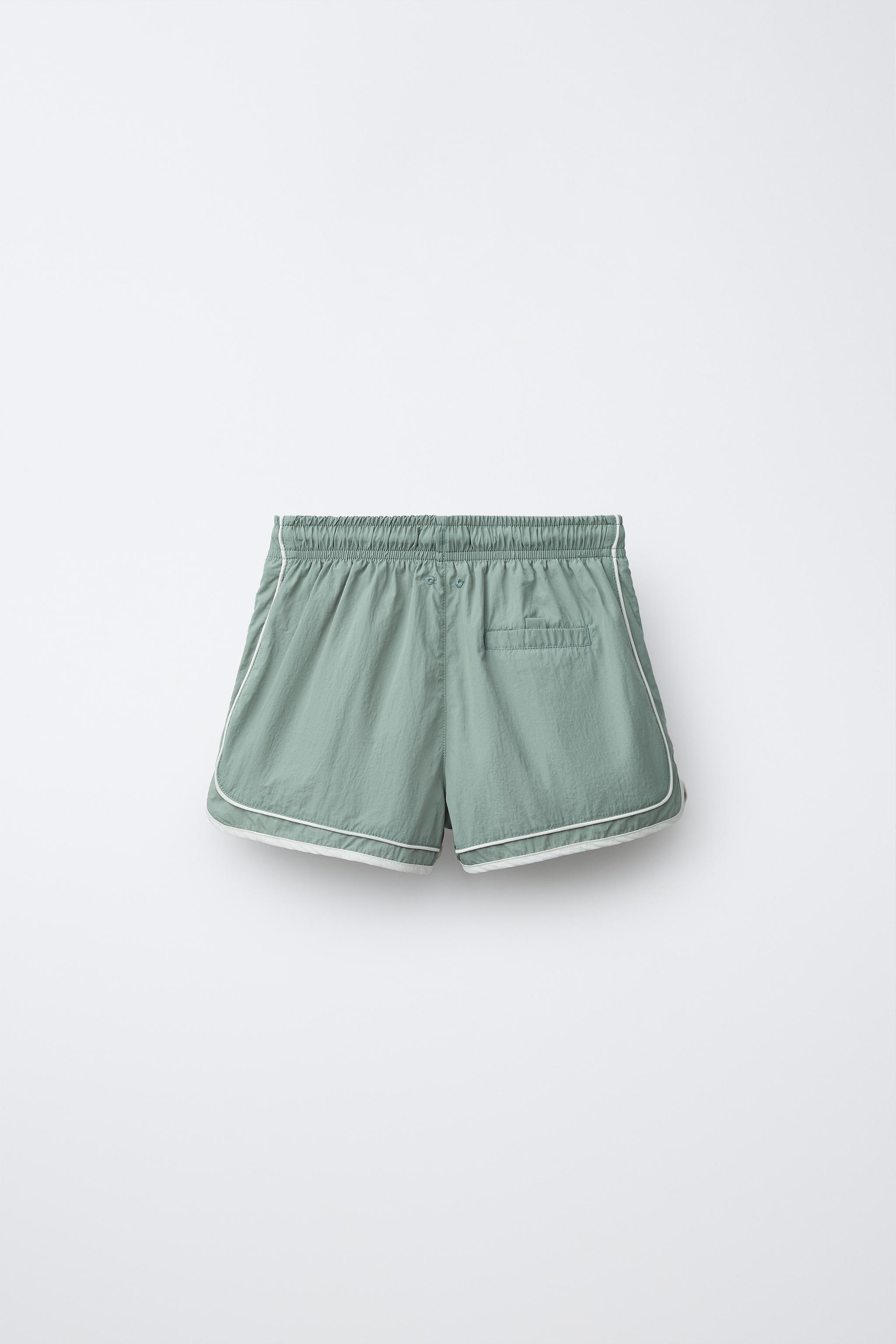 6-14 YEARS/ SWIM SHORTS WITH CONTRAST BANDS